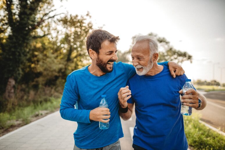 Two men out for a run, happy they had the mens health check
